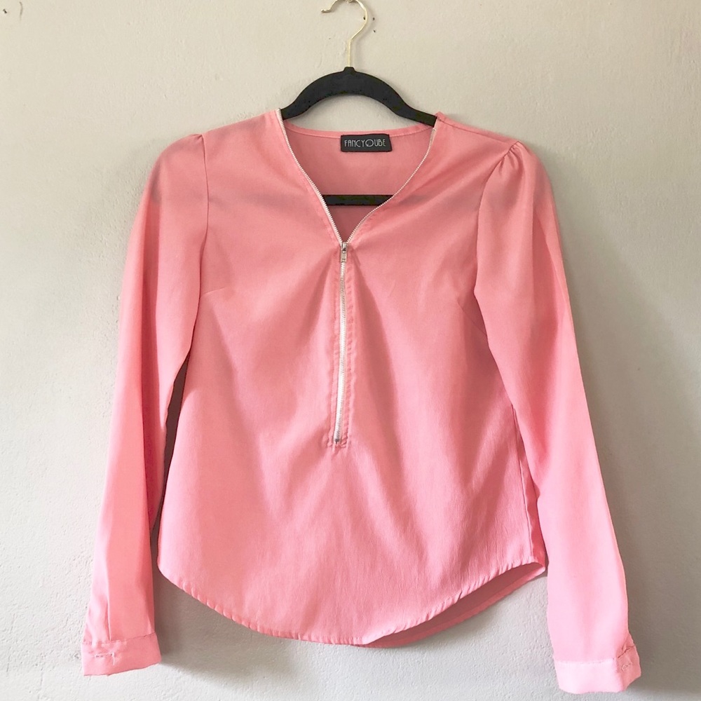 Zip down light peach colored long sleeve